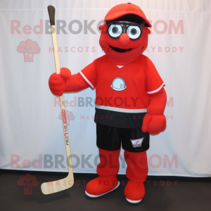 Red ice hockey stick mascot costume character dressed with Bermuda Shorts and Eyeglasses