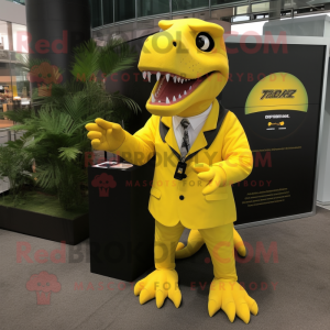 Yellow T Rex mascot costume character dressed with Suit Jacket and Keychains