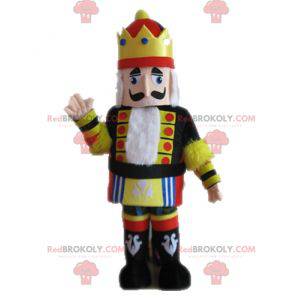 Mascotte de roi en tenue jaune noire et rouge - Redbrokoly.com