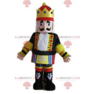 Mascotte de roi en tenue jaune noire et rouge - Redbrokoly.com