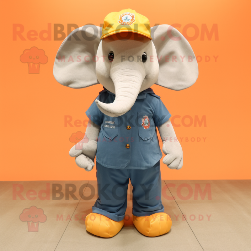 Peach Elephant mascot costume character dressed with Bootcut Jeans and Caps