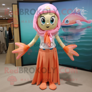 Peach mermaid mascot costume character dressed with Board Shorts and Scarf clips