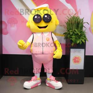 Pink Lemon mascot costume character dressed with Polo Shirt and Digital watches