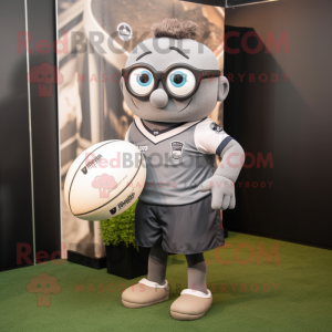 Gray Rugby ball mascot costume character dressed with T-Shirt and Eyeglasses