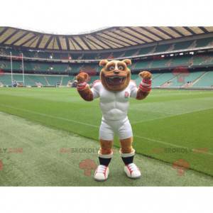 Zeer gespierde bruine hondenmascotte in sportkleding -