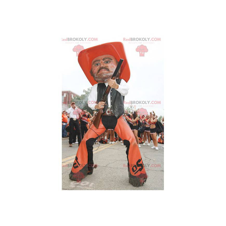 Mascote cowboy com roupas tradicionais laranja e pretas -