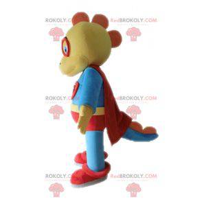 Yellow and blue dinosaur mascot dressed as a superhero -