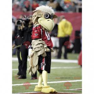 Mascotte d'oiseau de vautour beige en tenue de sport -