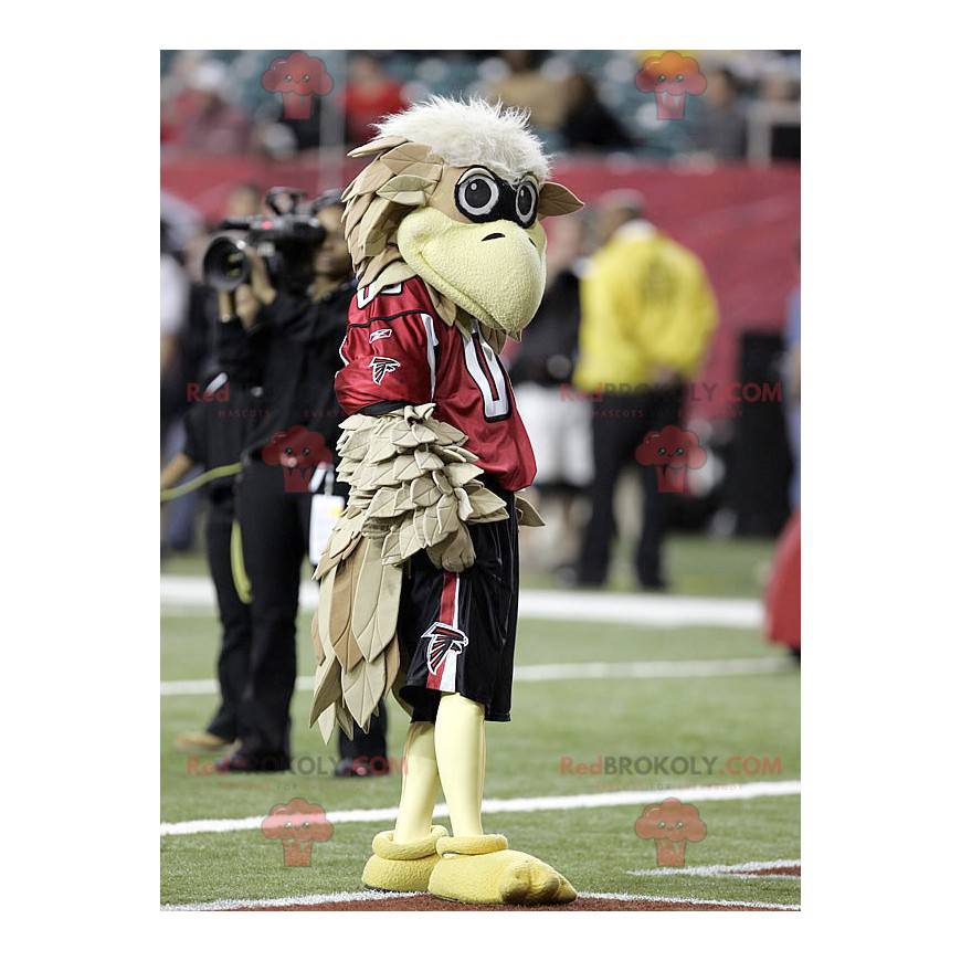 Mascote pássaro abutre bege em roupas esportivas -