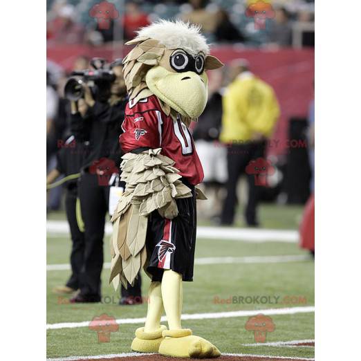 Mascote pássaro abutre bege em roupas esportivas -