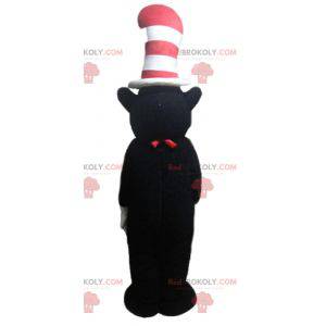Mascote urso preto e branco com um grande chapéu -