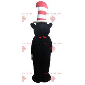 Mascote urso preto e branco com um grande chapéu -
