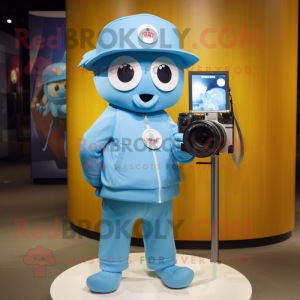 Sky Blue Camera mascot costume character dressed with Windbreaker and Brooches