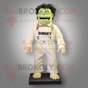 Personnage de costume de mascotte de monstre de frankenstein crème habillé avec une salopette et des épingles à cravate