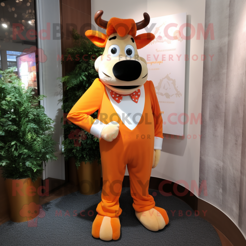 Orange Guernsey cow mascot costume character dressed with Dress and Bow ties Orange Guernsey cow mascot costume character dressed with Dress and Bow ties