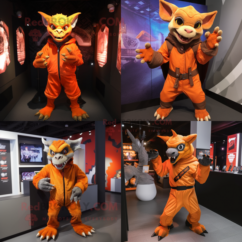 Orange Gargoyle mascot costume character dressed with Jacket and Gloves Orange Gargoyle mascot costume character dressed with Jacket and Gloves