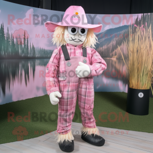 Mascotte d'Épouvantail rose déguisé en personnage habillé d'une Barboteuse et de Pochettes