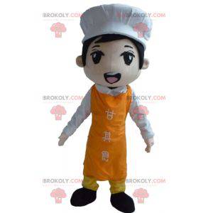 Asijský kuchař maskot se zástěrou a kuchařskou čepicí -