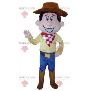 Mascote cowboy com vestido tradicional e chapéu - Redbrokoly.com