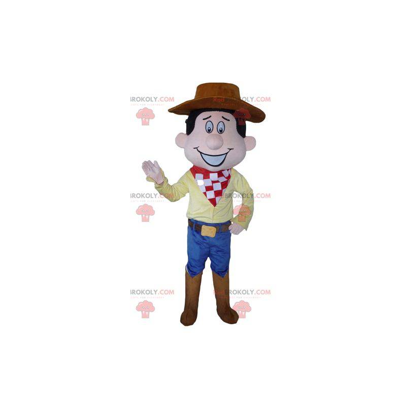 Mascotte del cowboy in vestito tradizionale con un cappello -