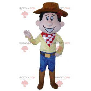 Cowboymascotte in traditionele kleding met een hoed -