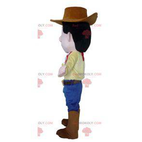 Cowboy maskot i traditionel kjole med hat - Redbrokoly.com