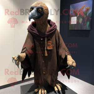 Brown Vulture mascot costume character dressed with Graphic Tee and Shawl pins