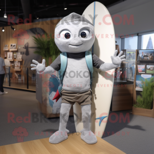 Silver Surfboard mascot costume character dressed with Boyfriend Jeans and Backpacks
