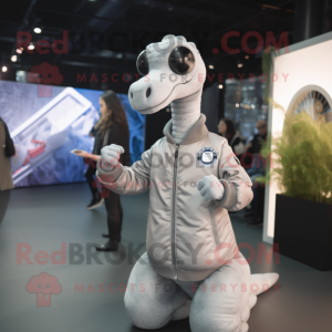 Silver Brachiosaurus mascot costume character dressed with Bomber Jacket and Smartwatches