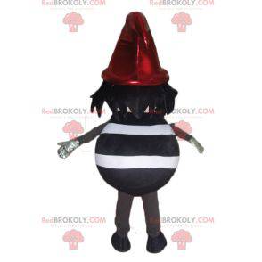 Black and white striped snowman mascot with a red cap -