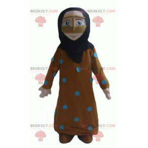 Oriental mascot of veiled woman dressed in orange and blue -