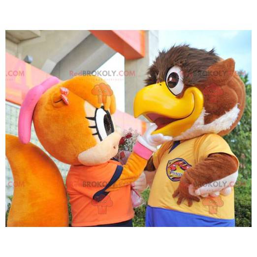 2 mascottes un gros oiseau marron et un écureuil orange -