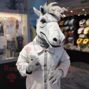 Silver Quagga mascot costume character dressed with T-Shirt and Lapel pins