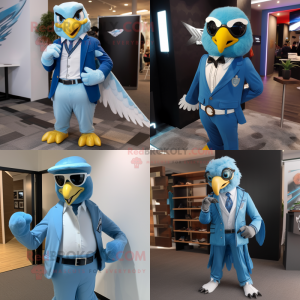 Sky Blue Hawk mascot costume character dressed with Blazer and Belts