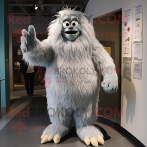 Gray Yeti mascot costume character dressed with Empire Waist Dress and Foot pads