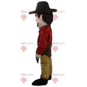 Mascotte de cow-boy habillé en rouge et jaune avec un chapeau -