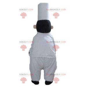 Mascotte de chef cuisinier avec une toque et une moustache -