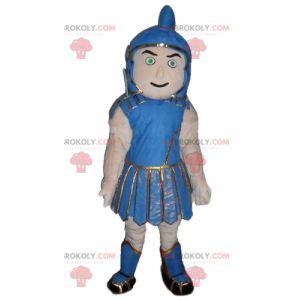 Mascote do gladiador em roupas tradicionais azuis -