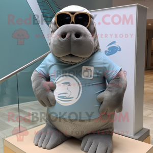 Gray Walrus mascot costume character dressed with Graphic Tee and Sunglasses