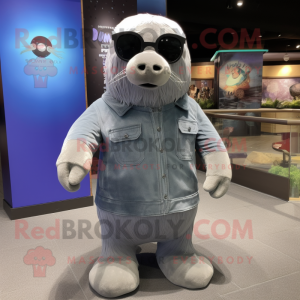 Gray Walrus mascot costume character dressed with Graphic Tee and Sunglasses