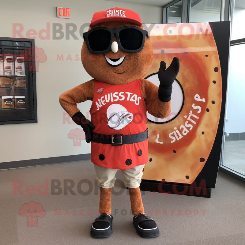 Rust pizza slice mascot costume character dressed with Board Shorts and Bracelet watches