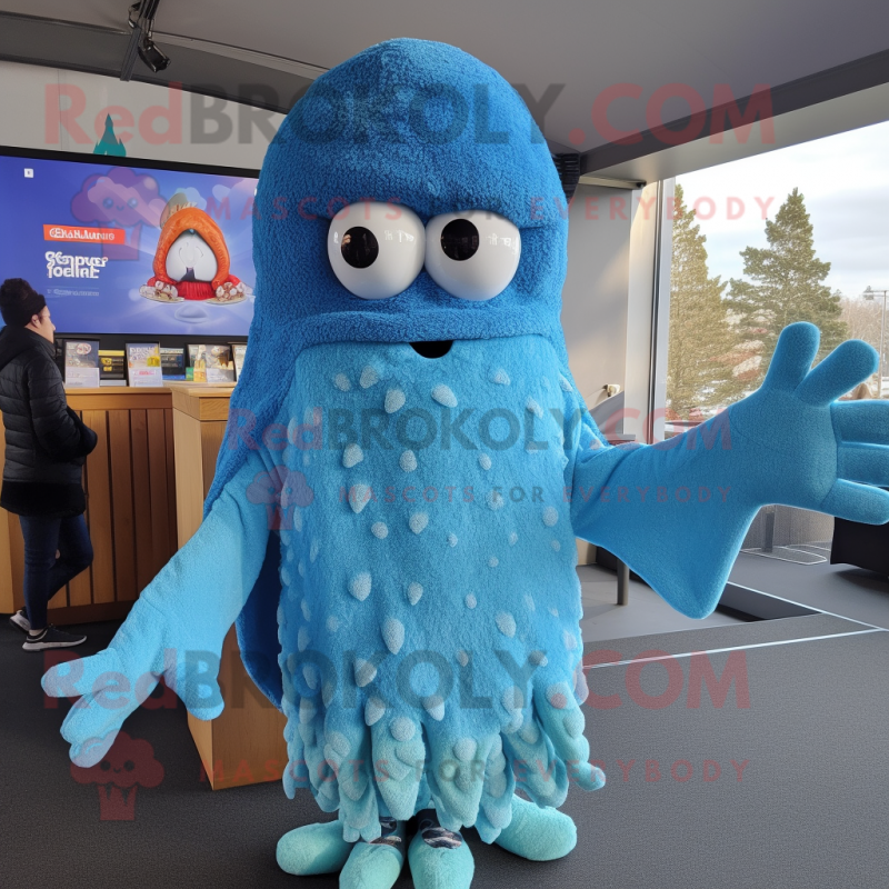 Blue Fried Calamari mascot costume character dressed with Sweater and Beanies Blue Fried Calamari mascot costume character dressed with Sweater and Beanies