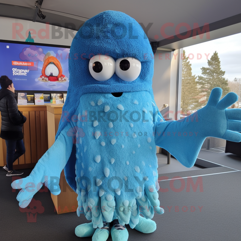 Blue Fried Calamari mascot costume character dressed with Sweater and Beanies