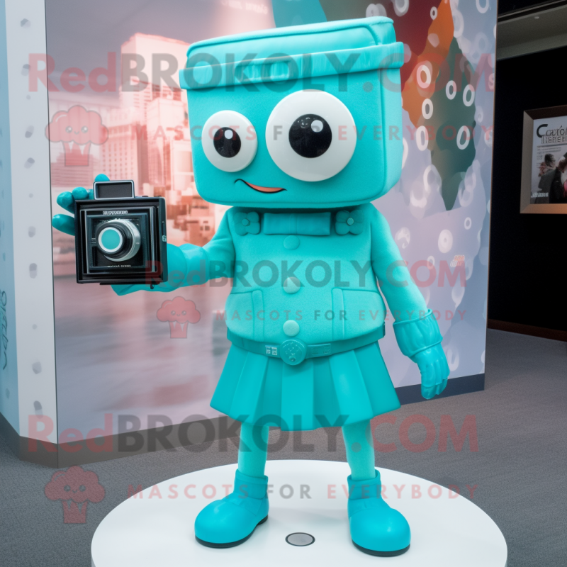 Cyan Camera mascot costume character dressed with Dress and Bracelet watches Cyan Camera mascot costume character dressed with Dress and Bracelet watches