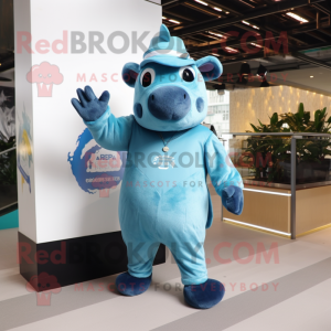 Sky Blue Tapir mascot costume character dressed with Flare Jeans and Caps
