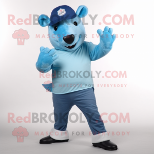 Sky Blue Tapir mascot costume character dressed with Flare Jeans and Caps