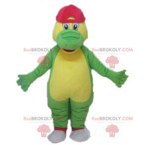 Mascotte de crocodile vert et jaune avec une casquette rouge -