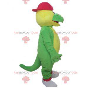Mascotte de crocodile vert et jaune avec une casquette rouge -
