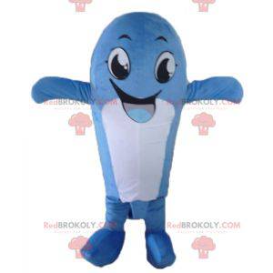 Mascota de ballena azul y blanca divertida y sonriente -