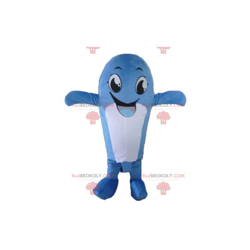 Mascota de ballena azul y blanca divertida y sonriente -